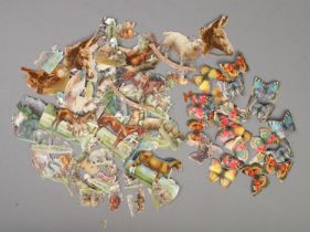 A large quantity of Victorian scraps of butterflies and other animals