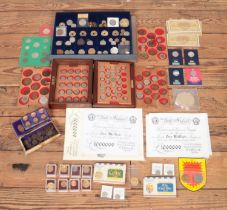 A large collection of coins, tokens and banknotes, to include GB, world and reproduction examples.