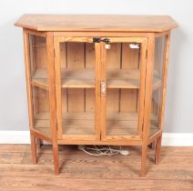 A pine hexagonal shape display cabinet