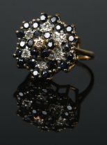 A large 9ct diamond and sapphire snowflake ring. Size MÂ½, 4.9g.