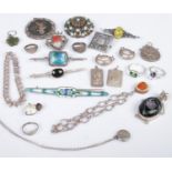 A quantity of silver jewellery. Includes enamelled brooch, rings, pendants, link bracelet, etc.