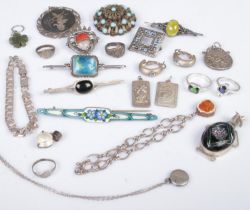 A quantity of silver jewellery. Includes enamelled brooch, rings, pendants, link bracelet, etc.