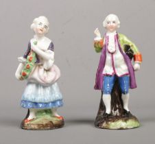 A pair of 19th century continental porcelain figures, lady and a gentleman. Both having impressed