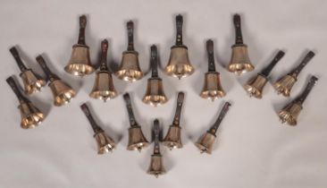 A set of eighteen early 20th century campanology hand bells, all with leather handles marked for J