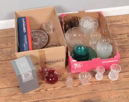 Teo boxes of assorted glassware to include boxed Dartington and Royal Scot Cranberry examples.