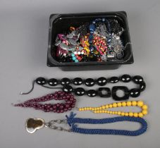 A box of statement costume jewellery necklaces to include mother of pearl examples. Includes