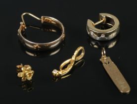 A small collection of gold jewellery. Includes 14ct gold and diamond earring, 9ct gold pendant, etc.