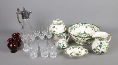 A collection of Mason's Ironstone in the chartreuse pattern along with a quantity of glassware to