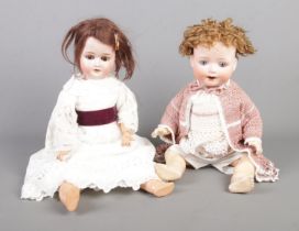 Two vintage bisque head dolls to include Schoenau & Hoffmeister (1909 2x Germany) and Heubach
