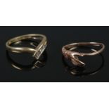 Two 9ct gold rings. Includes 9ct gold diamond wish bone ring, etc. 3.11g. Both size N.