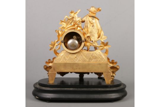 A 19th century French gilt mantel clock under glass dome. The clock surmounted with a cavalier. - Image 6 of 8