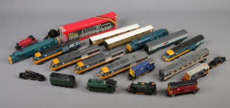 A collection of Hornby Railway model trains and carriages, various designs. Mixed condition