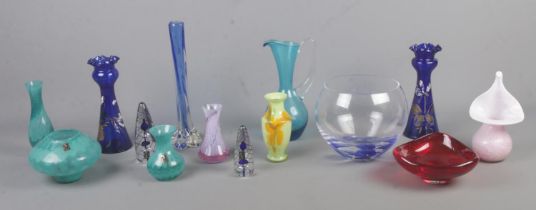 A collection of studio and art glass, to include Caithness and Langham examples. Crack to the base