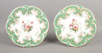 A pair of 19th century Rockingham porcelain dessert plates. Decorated with hand painted floral