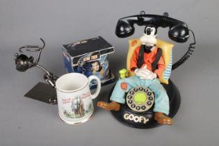 A Warner Bros push button Goofy phone together with Star Trek jumbo mug and keyring, Plymouth mug