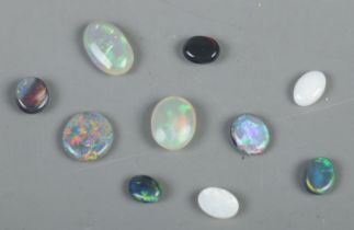 A small quantity of loose opals.