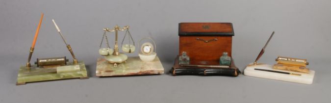 Two desk stands, both with perpetual calendars, including an onyx example, together with an onyx