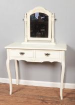 A white painted dressing table with two drawers and mirror. Height: 139cm, Width: 90cm, Depth: 40cm.