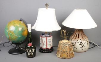 A collection of table lamps and light fittings, to include Orion 25 globe, Chinese porcelain and