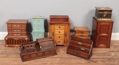 A collection of wood and treen, to include in/out tray, jewellery boxes, miniature chest of