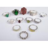 Twelve silver dress rings. Includes coloured paste set examples, etc. 50g