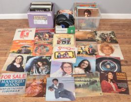 Three boxes of records. Includes Status Quo, Barry Manilow, Diana Ross, etc.