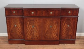 A breakfront flame mahogany sideboard Hx90cm Wx165cm Dx44cm.