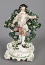 A 19th century continental Samson of Paris porcelain figure in the manner of Chelsea-Derby. Features