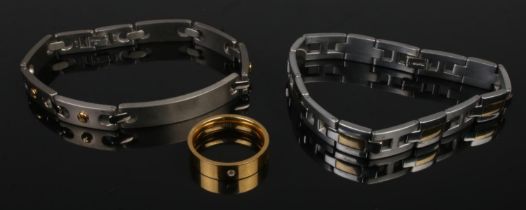 Two titanium bracelets along with a gilt titanium ring.