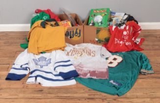 Two boxes of vintage and later sports shirts including replica rugby, American football and ice