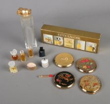 A small collection of perfume miniatures to include Givenchy Ysatis, Oscar De La Renta, Gucci