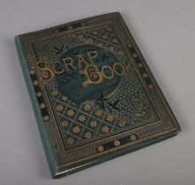 A scrap book album filled with Victorian and late scraps of various themes including horses,
