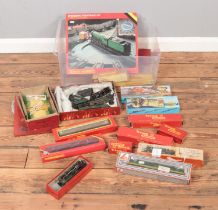 A quantity of various boxed railway models and accessories including models by Tri-ang, Hornby,