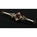 A vintage 9ct gold amethyst and seed pearl brooch. 1.88g.