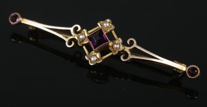 A vintage 9ct gold amethyst and seed pearl brooch. 1.88g.