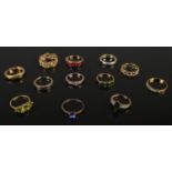 Twelve silver gilt dress rings. Includes snake example, etc. 33g.