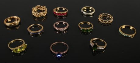 Twelve silver gilt dress rings. Includes snake example, etc. 33g.