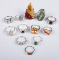Twelve silver dress rings. Includes coloured paste stone examples, etc. 62g.