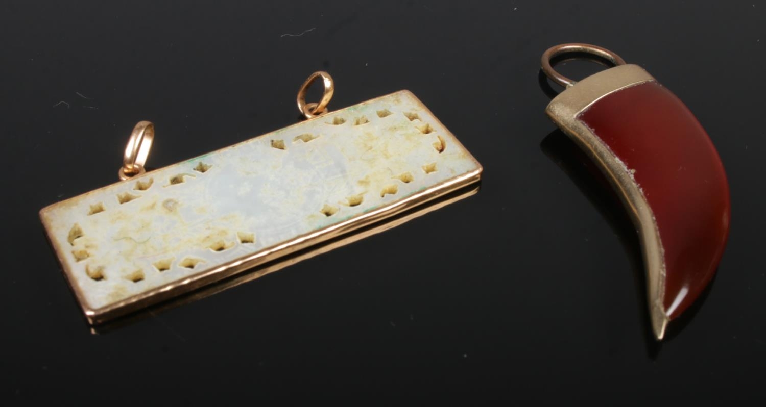 Two gold mounted pendants. Includes jade tablet example, etc.