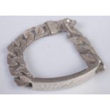 A heavy link silver bracelet. Engraved Michael. 59g.