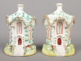 A pair of 19th century Staffordshire flat backs in the form of cottage pastille burners. Height 16.