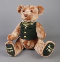 A Harrods 1849-1999 anniversary teddy bear featuring green waistcoat checked ascot.