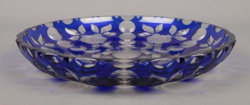 A vintage Harrach blue flash glass dish, decorated with flowers. Signed to base. Diameter 29cm.