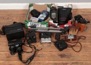 Two boxes of mostly photographic equipment. Includes Olympus macro lens, tripod, boxed Miranda