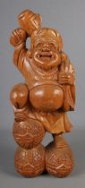 A substantial large carved wooden buddha statue. Hx55cm