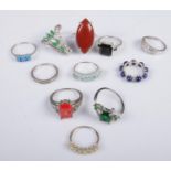 Eleven silver dress rings. Includes colour paste stone examples, etc. 37g.