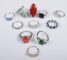 Eleven silver dress rings. Includes colour paste stone examples, etc. 37g.