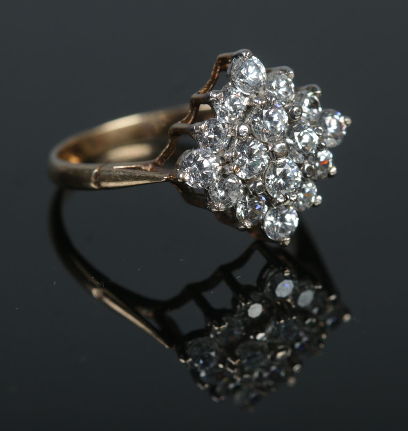 A 9ct gold Moissanite cluster ring Size O, 2.66g
