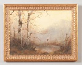 John Trickett (born 1953), a small gilt frame oil on panel, river scene with a pheasant in flight.