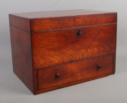 A 19th century mahogany apothecary cabinet. Having lockable to section and drawer to base. Height
